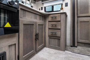 Lower kitchen cupboards space in 238RK travel trailer