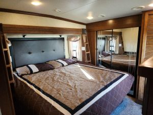 Bedroom with king size bed in 2015 Heartland Gateway