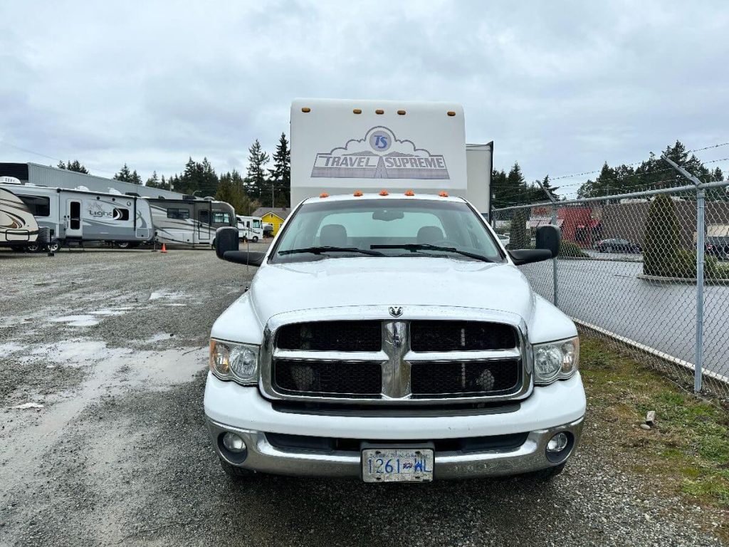 Front view of the truck attached to the 1993 Travel Supreme