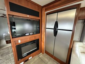 Entertainment area plus kitchen appliances (fridge)