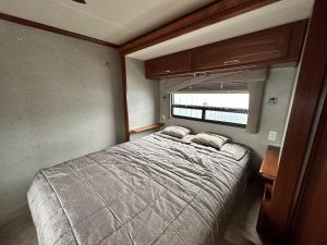 Master bedroom within the 2008 Fleetwood Pace Arrow